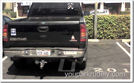 Black Chevrolet truck parked rudely - youparkrudely.com