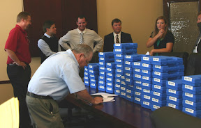 Cobra Enterprises prepares to present pistols to Utah State Legislators