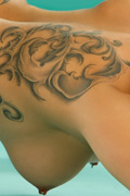 AMBYA - Tangent shows off her tattoos