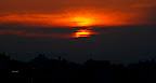 The sun wrapped in mystery, or just clouds?