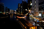 From a bridge over the Kanda River, the candles merely added a small string of light to an already pleasant view.