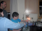 Alex and Amy Light the Candles - Chanuakah 2006