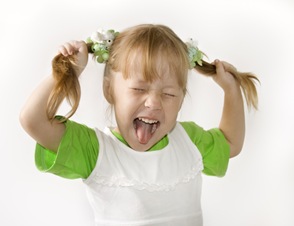 shutterstock_27143851 Girl pull ponytails