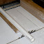 A flat spot must be milled on the round flute body, over the two tone holes. I use the table saw for this...very carefully! A flat spot must be milled on the round flute body, over the two tone holes. I use the table saw for this...very carefully!