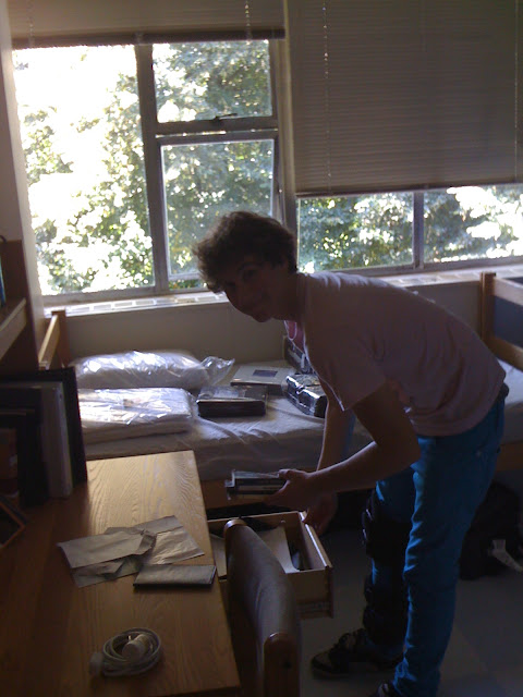 David unpacking....There's that passport!