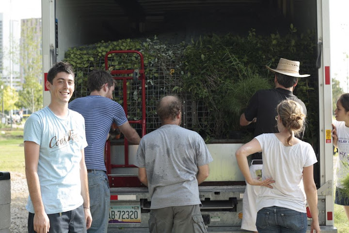Ryan, one of the designers of the green wall, smiles for the camera as he sees his baby paked away for a long trip!