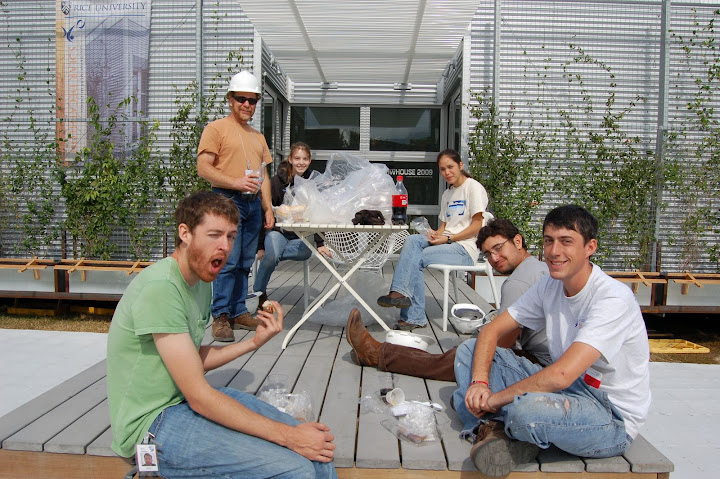 Our small but Dedicated team eating lunch on the ZEROW's porch. There were about twenty free box lunches from Dell -- so we shared with other workers!