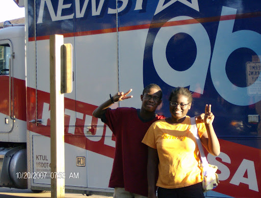 front of the Channel 8 news van!
