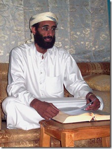 Anwar_al-Awlaki_sitting_on_couch,_lightened