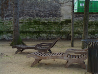 Date: December 2007</p>
<p>Location: Paris, Gallerie Rodin</p>
<p>Story: I have never been very fond of Paris. I have been there many times. I t always rains when I am there. This trip was no exception. It rained every single day. I somehow, managed to take a lot of pictures. We will spend the next few weeks in Paris.</p>
<p>This picture was taken in the gardens of the Rodin Gallery. I loved the gardens and could have spent a lot more time there. Simple benches that have little reason for being there. Yet here they are strewn about the yard. No one appeared to take advantage of them. I wonder if we all thought they would fall apart if we sat on them.