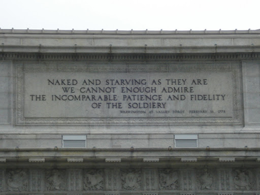 Inscription at top of arch