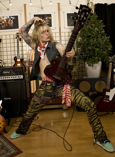 Justin Hawkins launches the Gibson Dark Fire Guitar at The Gibson Guitar Studio in London with his band Hot Leg