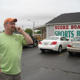 Don Middlebrook being interviewed via cell phone by DJ Jeff Allen live on air during the launch party for the new Sandbar Radio show. Don is standing outside the Scoreboard sports bar just before he began his show for the PHINS club.
