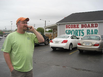 Don Middlebrook being interviewed via cell phone by DJ Jeff Allen live on air during the launch party for the new Sandbar Radio show. Don is standing outside the Scoreboard sports bar just before he began his show for the PHINS club.