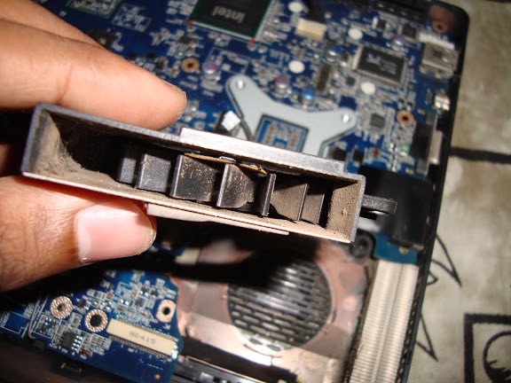 I have already removed a small mass of dust and lint from the blower side of the fan. This is a centrifugal blower. DSC01901.jpg
