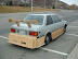 Redneck car tuning - Wooden bumpers for improved aerodynamics.