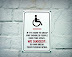 Parking space sign - If it's hard to grasp why disabled people need this space...