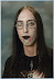 Lame goth kid - Goth kids love to wear chains - temporary tatoos - fishnet shirts/stockings - and sharply contrasting cosmetics.