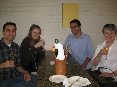 Graduating second-year students and SAIS Bologna Center alums Chris Lewis, Lisa Kiernan, and Chris Testa enjoy a glass of wine with Lisa's mom