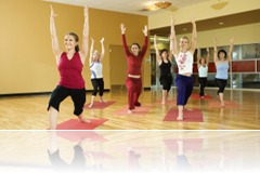 Adult females in yoga class. Adult females in yoga class.