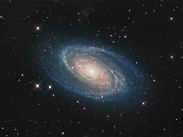 M81, a spiral galaxy in Ursa Major. A ‘wavefront’ Dyson sphere culture might spread across such a galaxy, causing stars to drop out of visible light entirely, one by one, to be detected in the infrared. Credit and copyright: Giovanni Benintende. M81, a spiral galaxy in Ursa Major. A ‘wavefront’ Dyson sphere culture might spread across such a galaxy, causing stars to drop out of visible light entirely, one by one, to be detected in the infrared. Credit and copyright: Giovanni Benintende.