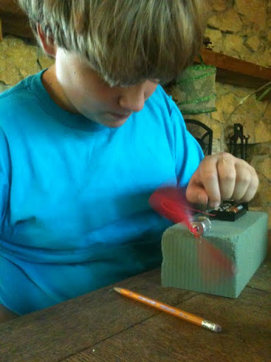 Sam building his waterbot