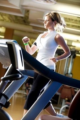 Running on the electric treadmill Running on the electric treadmill
