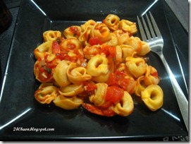 tortellini with shrimps in tomato sauce