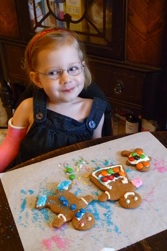 Decorating gingerbread with her friends