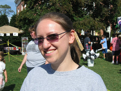 Modeling the Paint-a-Pumpkin punk look, Katie with a clothespin on her ear.