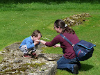 Daniel eating smarties from Emma (Hailes Abbey).JPG