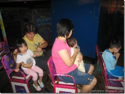 Rong Rong and my mother(in yellow) sitting in a Toot-toot Train