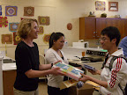 Andy He completes the program and receives his awards from ISA liason Barb Rand and Alana Okamoto