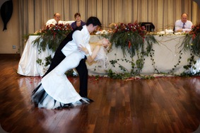Groom dipping bride during opening dance of wedding - Joretha Taljaard Wedding Photography