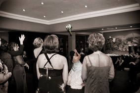 Bride throwing her bouquet - Joretha Taljaard Wedding Photography