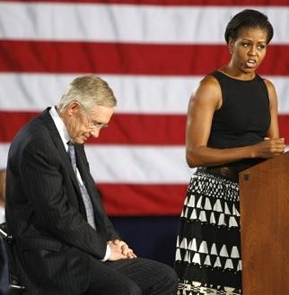 [50760-u-s-senator-harry-reid-looks-at-the-floor-as-first-lady-mich[6].jpg]