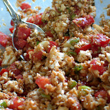 Our Raw Spanish Rice is a 100x better than the grain stuff. Pulsed cauliflower, diced roma tomatoes, chopped green onions then spices and lime juice to taste. We dig cumin, chili powder, garlic powder, paprika, oregano, and salt.