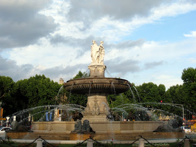 Huge city fountain in a roundabout in Aix en Provence