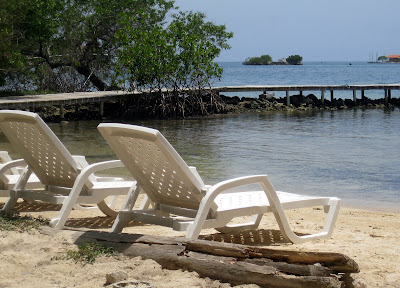 Lounge chairs on the beach on an island in the Islas del Rosario in Colombia