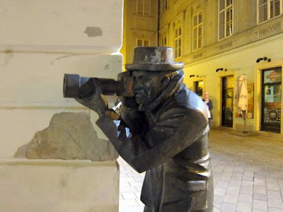 Sculpture of a man with a camera in Bratislava Slovakia