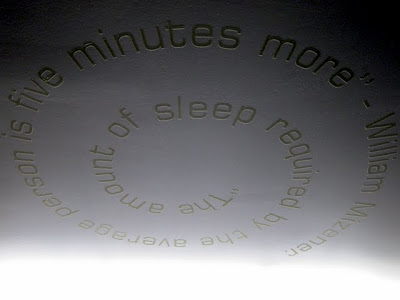 A Hoxton Hotel room ceiling with words