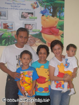 Family wearing Pooh tshirst