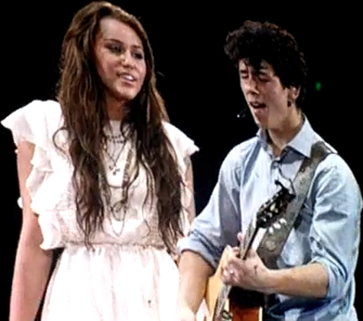 Miley Cyrus and Nick Jonas Before The Storm Live Performance at Jonas Brothers Tour picture