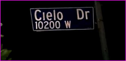 Cielo Drive sign post showing the way to 10050 it would be after midnight