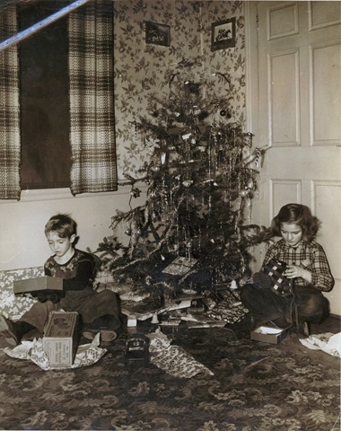 [1947 12 25 David and Janice Shaw Christmas morning[2].jpg]