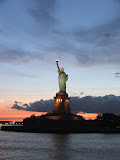 Statue of Liberty at Sunset New York City Harbor.