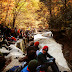 A TON of people to be chillin by river out in the mountains!
