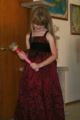 Amara models her 1st gown.