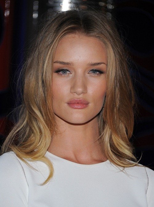 HOLLYWOOD, CA - MAY 11: Actress Rosie Huntington-Whiteley arrives at the 2011 Maxim Hot 100 Party with New Era, Miller Lite, 2(x)ist and Silver Jeans Co. held at Eden on May 11, 2011 in Hollywood, California. (Photo by Angela Weiss/Getty Images For MAXIM) *** Local Caption *** Rosie Huntington-Whiteley