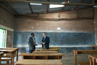 Bruce Rossington visits with a teacher
